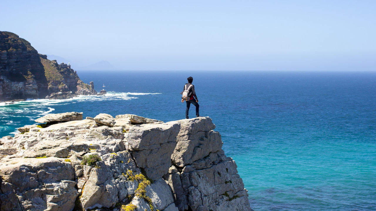 Traveller overlooking the ocean at Cape Point